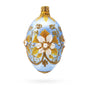 Glass Blue and Gold Embossed Floral Glass Egg Ornament in Blue color Oval