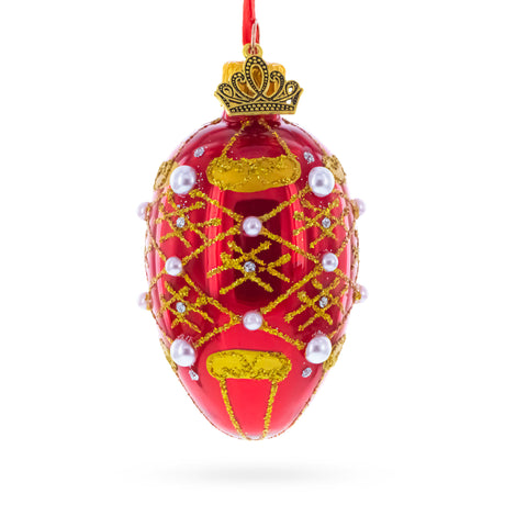 Glass Red with Gold Glitter, Pearl Accents, and Floral Design Mini Glass Egg Ornament 2.9 Inches in Red color Oval