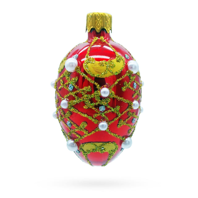 Glass Red with Gold Glitter, Pearl Accents, and Floral Design Mini Glass Egg Ornament in Red color Oval