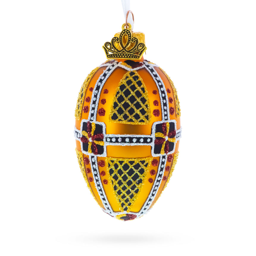 Glass Amber with Red, Black, and Gold Geometric Pattern Mini Glass Egg Ornament 2.9 Inches in Gold color Oval