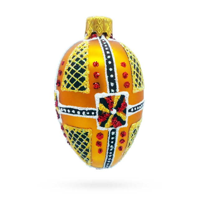 Glass Amber with Red, Black, and Gold Geometric Pattern Mini Glass Egg Ornament in Gold color Oval