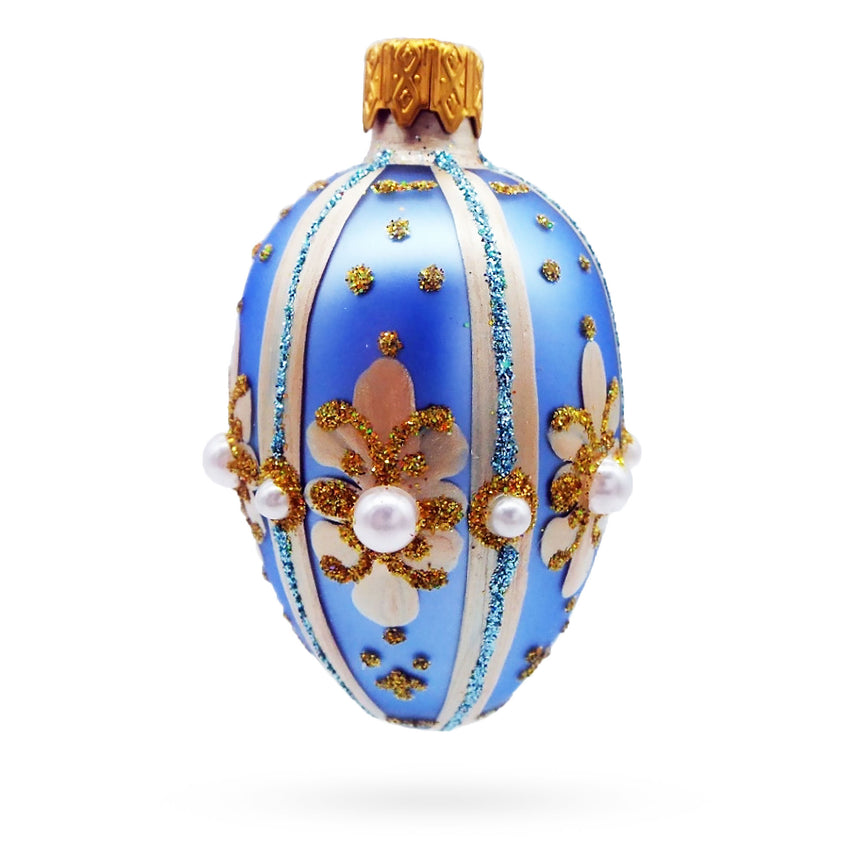 Glass Powder Blue with Gold Glitter and Pearl Accents Mini Glass Egg Ornament in Blue color Oval