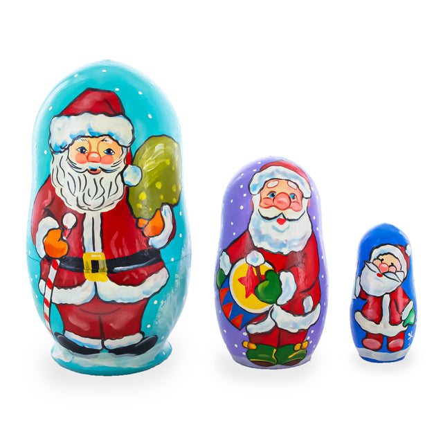 Wood Set of 3 Santa with Gifts Wooden Nesting Dolls Figurines 4.25 Inches in Multi color