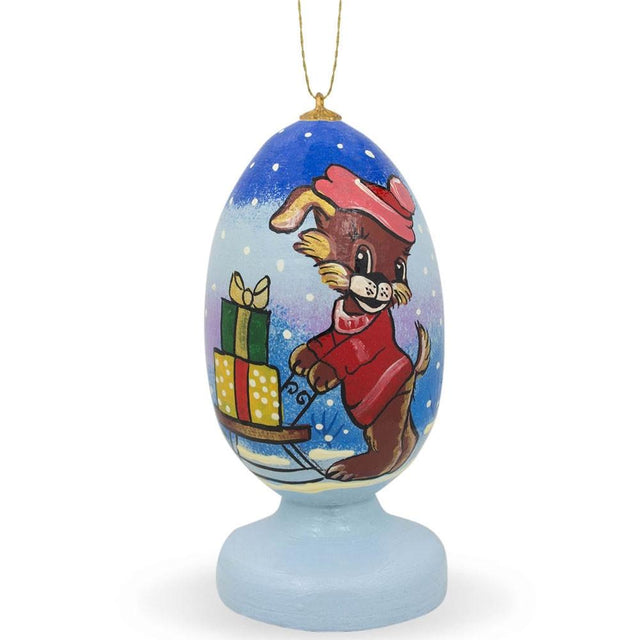 Wood Dog Delivering Christmas Gifts on Sleigh Wooden Christmas Ornament in Multi color Egg