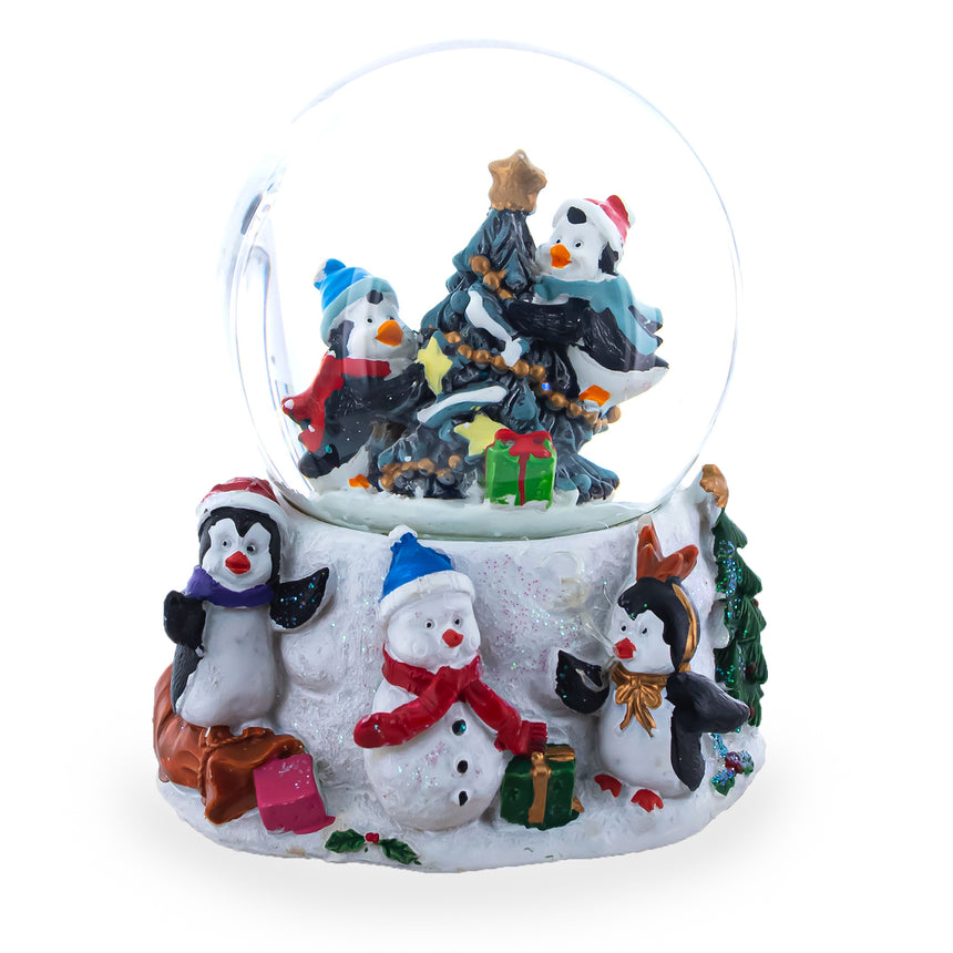 Resin Penguins' Festive Tree Celebration Snow Water Globe in White color Round