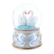 Glass Enchanted Swans Spinning Musical Water Snow Globe in White color Round