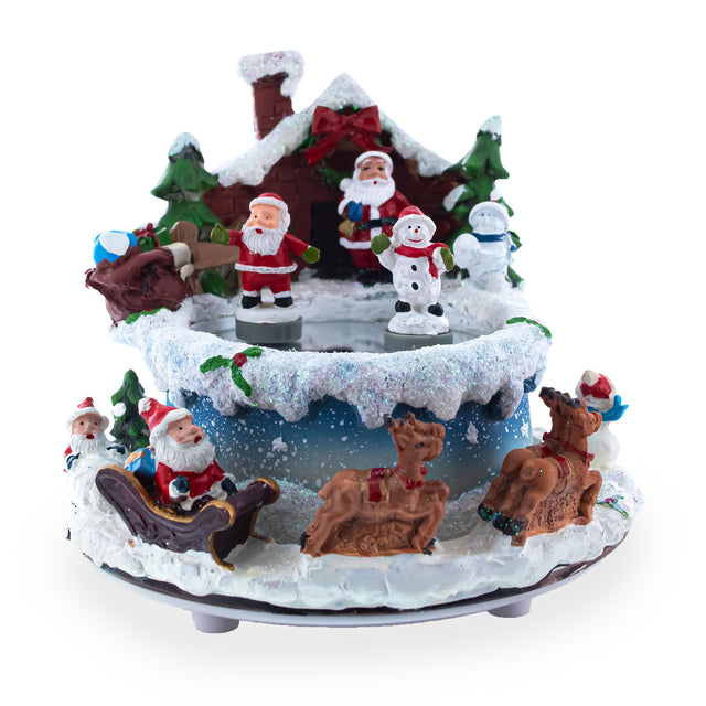 Resin Frosty Skating Spectacle: Animated Musical Figurine with Santa and Snowman Dancing on Ice Rink in Multi color