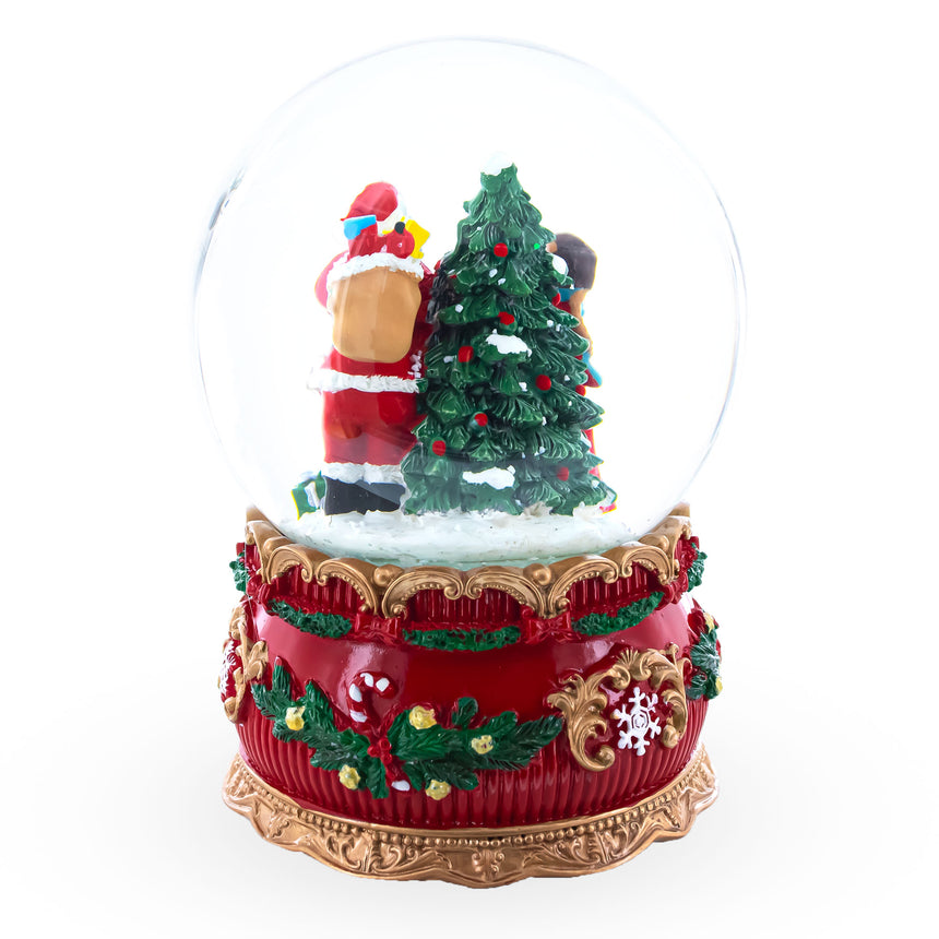 Santa's Gift Giver Musical Snow Water Globe ,dimensions in inches: 6 x 3.5 x 3.5