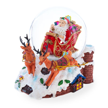 Santa Delivering Gifts Musical Christmas Water Snow Globe ,dimensions in inches: 6 x 4 x 4