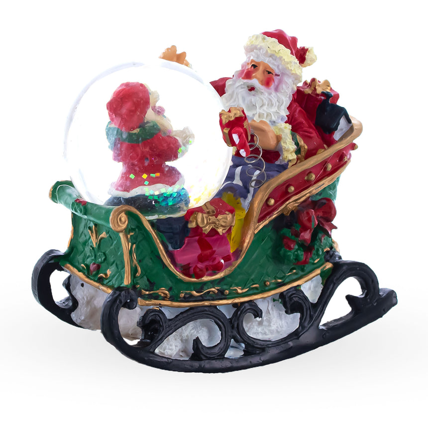 Resin Santa's Joyful Sleigh Ride Mini Snow Water Globe in Multi color