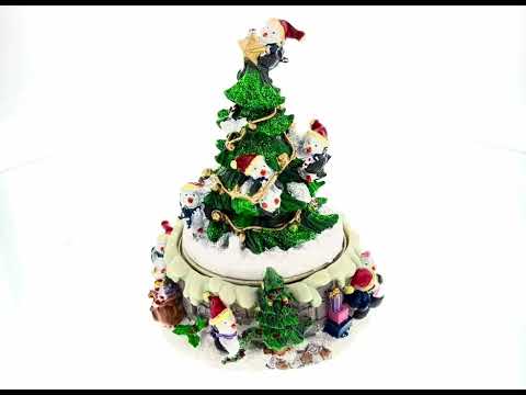 Penguin Festivity: Spinning Christmas Tree Musical Figurine with Decorating Penguins
