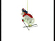 Adventurous Bear and Penguin Skiing Glass Christmas Ornament