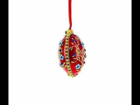 Blue Bejeweled Flowers on Red Glass Egg Ornament 4 Inches