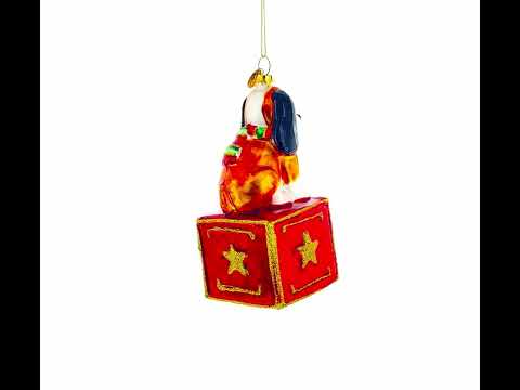 Playful Toy Dog on Festive Red Box Glass Christmas Ornament