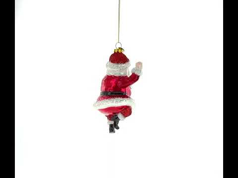 Santa Boogying in Festive Red Attire Blown Glass Christmas Ornament