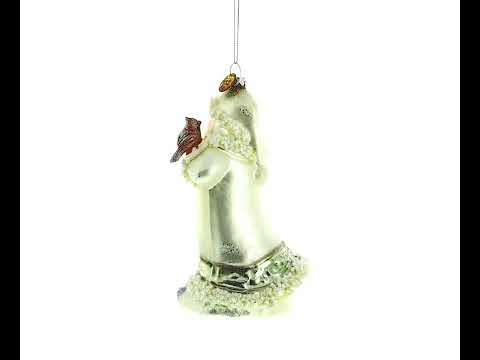 Santa Holding Cardinal and Raccoon Glass Christmas Ornament