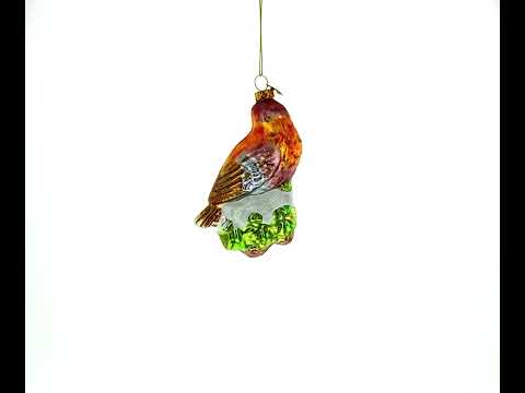 Bird Perched on Snowy Tree Branch Glass Christmas Ornament