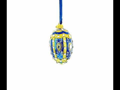 White Scrolls on Blue Glass Egg Ornament 4 Inches