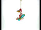 Laid-back Pelican on Inflatable Ring Blown Glass Christmas Ornament