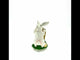 Enchanted Bunny and Chick Amidst Blooms Figurine