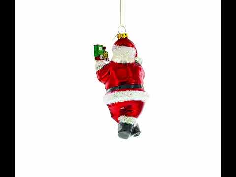 Santa Decorating the Train Blown Glass Christmas Ornament