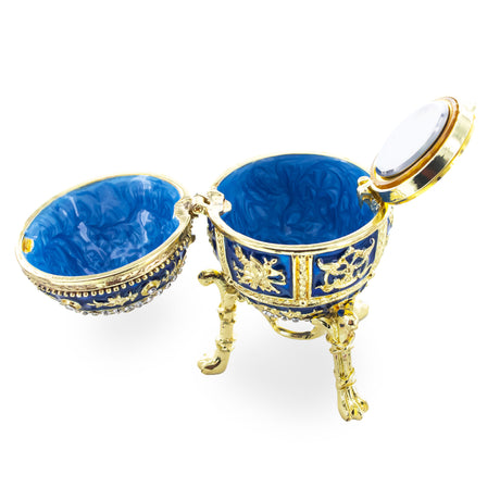 Blue Enamel Royal Inspired Imperial Easter Egg with Clock Surprise ,dimensions in inches: 2.8 x 1.7 x 1.7