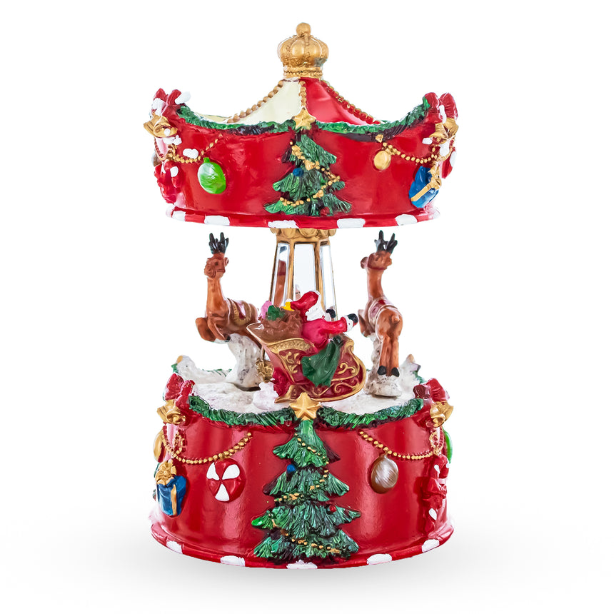 Resin Santa's Merry Carousel Ride Spinning Musical Figurine in Red color