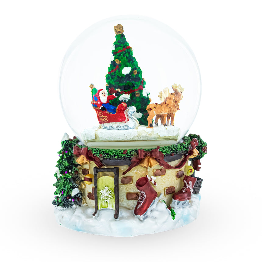 Resin Rotating Santa's Tree Serenade Musical Water Globe in Multi color