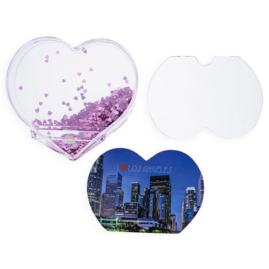 Shop Heartfelt LA Memories: Los Angeles Clear Acrylic Heart Shaped Water Globe Picture Frame. Buy Water Globe Picture Frames Travel Los Angeles Clear Heart Plastic for Sale by Online Gift Shop BestPysanky DIY frame photo DIY craft kit Christmas water globe snowglobe music box musical collectible figurine xmas decoration rotating animated spinning animated unique picture personalized cool glitter flakes