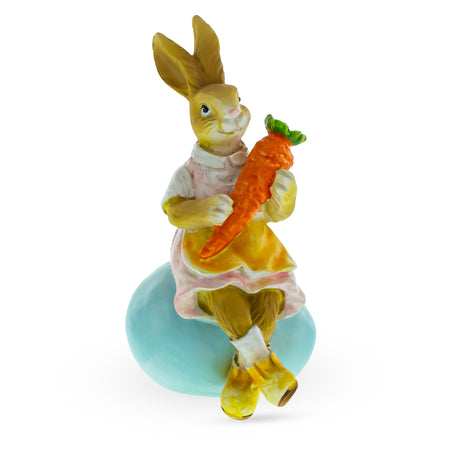 Shop Springtime Serenity: Mother Bunny Cradling Carrot Atop a Decorative Easter Egg Figurine. Buy Easter Figurines Bunnies Multi  Resin for Sale by Online Gift Shop BestPysanky Easter Bunny figurine decoration