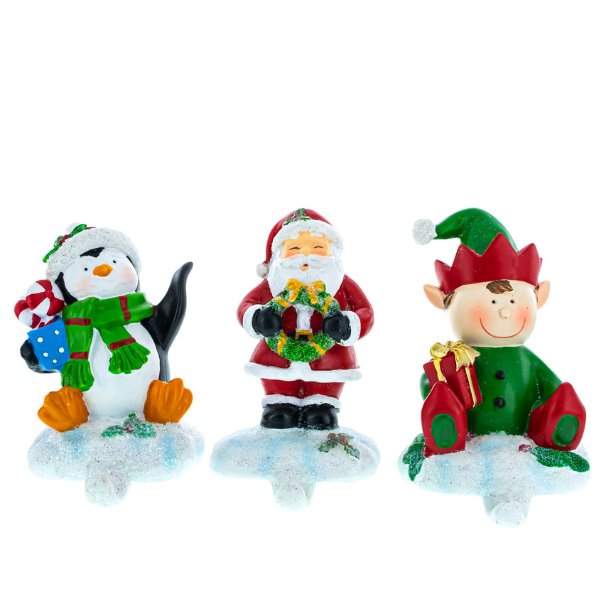 Resin Set of 3 Christmas Stocking Holders – Santa, Penguin, and Elf Holiday Mantel Decorations in Multi color