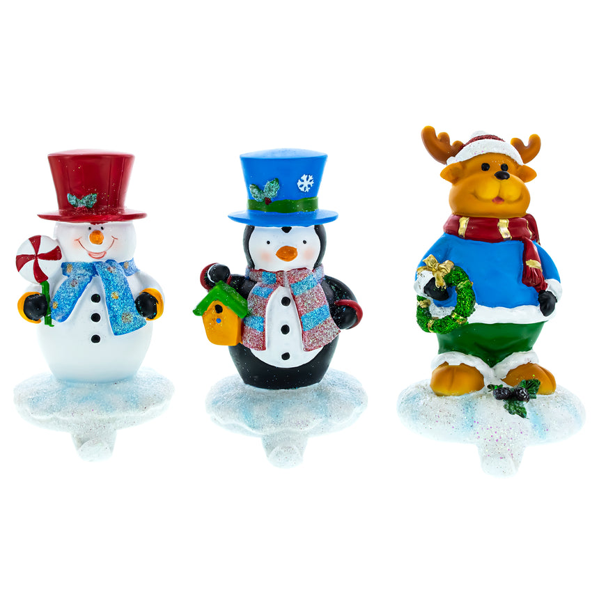 Resin Set of 3 Holiday Stocking Holders – Snowman, Penguin, and Reindeer Christmas Mantel Decor in Multi color