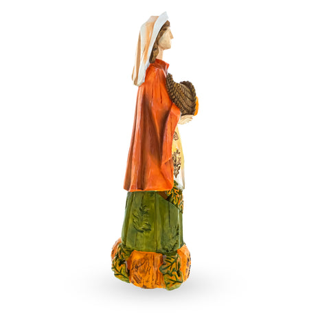 Pilgrim Woman Holding Horn of Plenty Cornucopia Thanksgiving Figurine ,dimensions in inches: 11.2 x 3.8 x 3.8