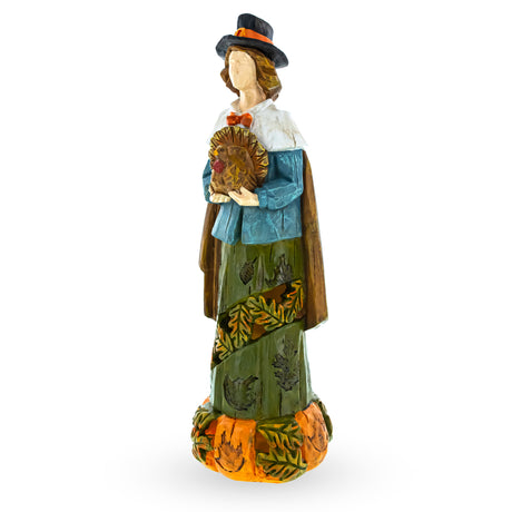 Resin Thanksgiving Tradition: Pilgrim Man Holding Turkey Figurine in Multi color