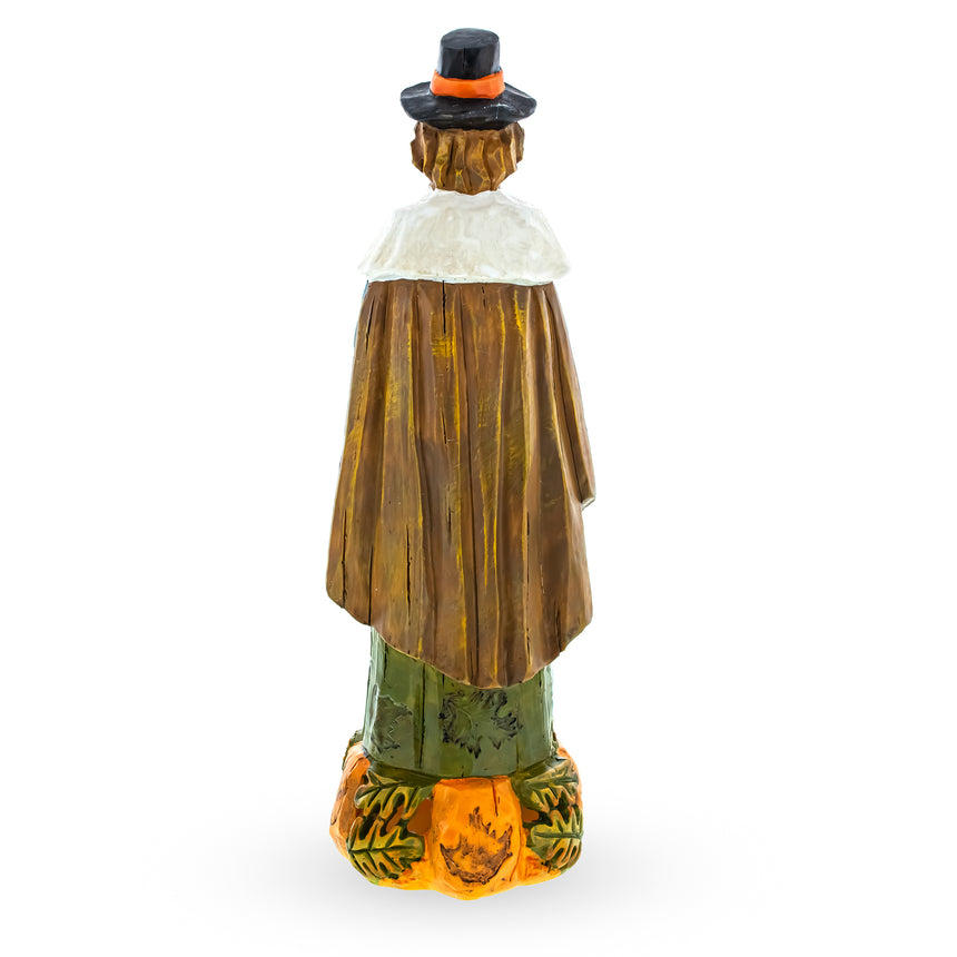 Thanksgiving Tradition: Pilgrim Man Holding Turkey Figurine ,dimensions in inches: 11.8 x 3.8 x 3.7