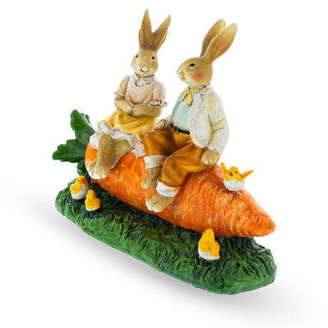 Bunny Couple in Love Sitting on a Carrot Figurine ,dimensions in inches: 7.7 x 6.3 x 3.4